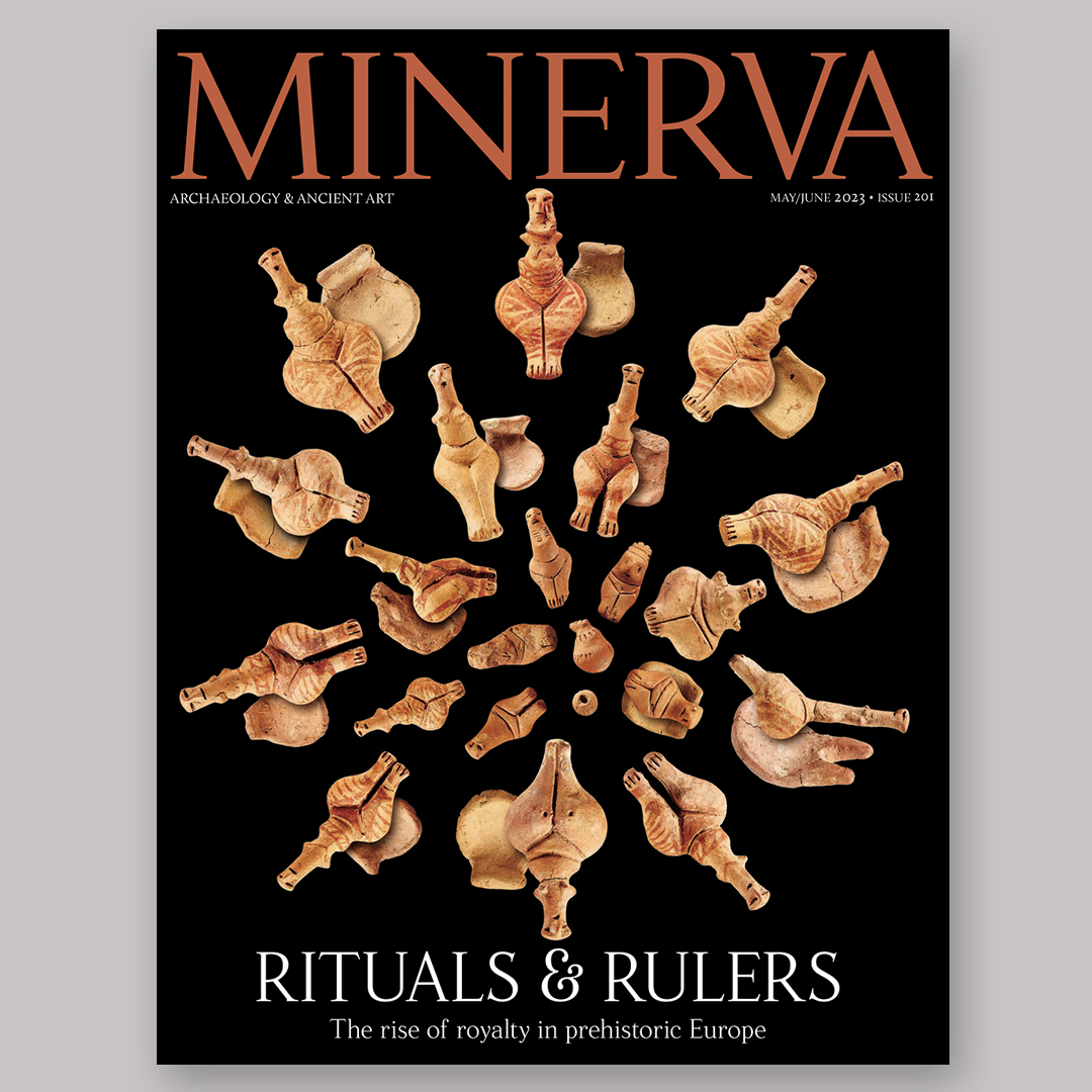 front cover of a magazine showing a group of ceramic figurines on black background